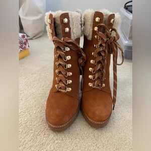 Lace up high heel boots with the furrrrrr